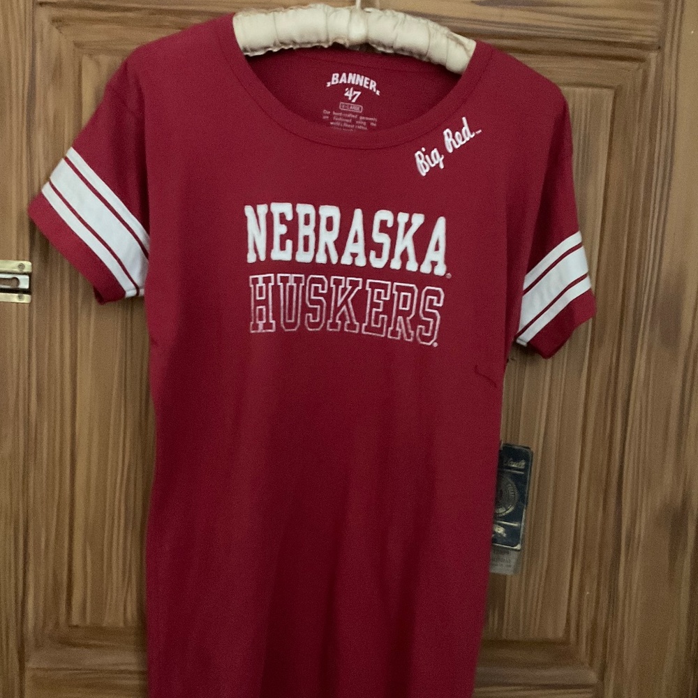 NE boutique purchased NE Husker shirt. NWT